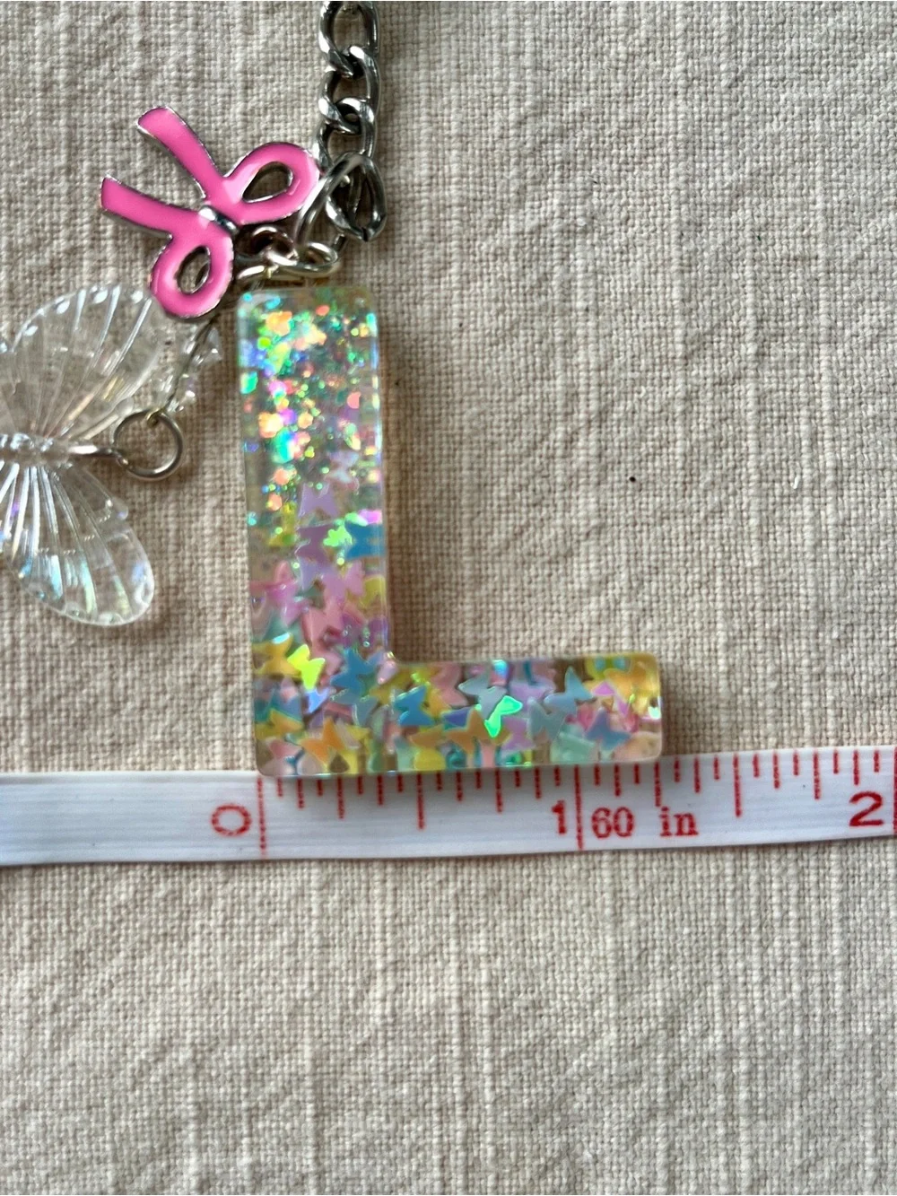 🦋 'L' Glitter Letter Keychain & Bag Charm with 🎀 Bow & Butterfly Accents